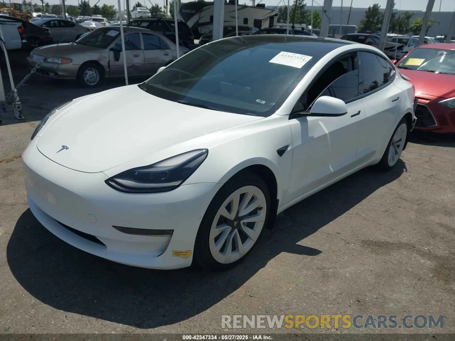 2 fotografías del automóvil dañado 5YJ3E1EAXMF089282 TESLA MODEL 3 2021