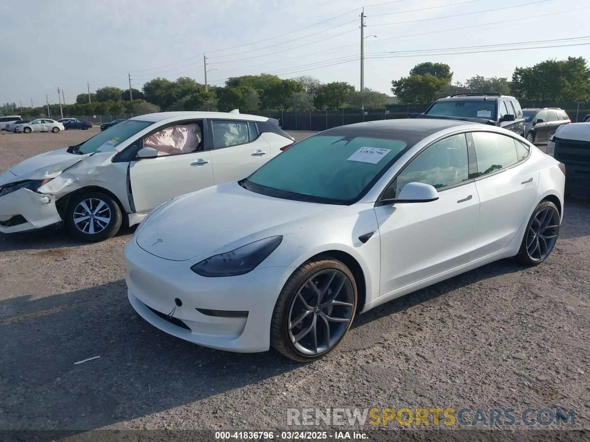 2 fotografías del automóvil dañado 5YJ3E1EAXMF908601 TESLA MODEL 3 2021
