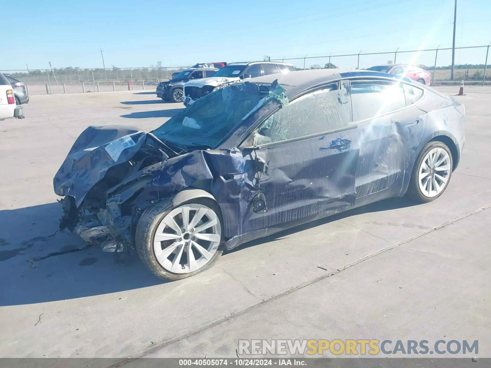 2 fotografías del automóvil dañado 5YJ3E1EAXMF920716 TESLA MODEL 3 2021