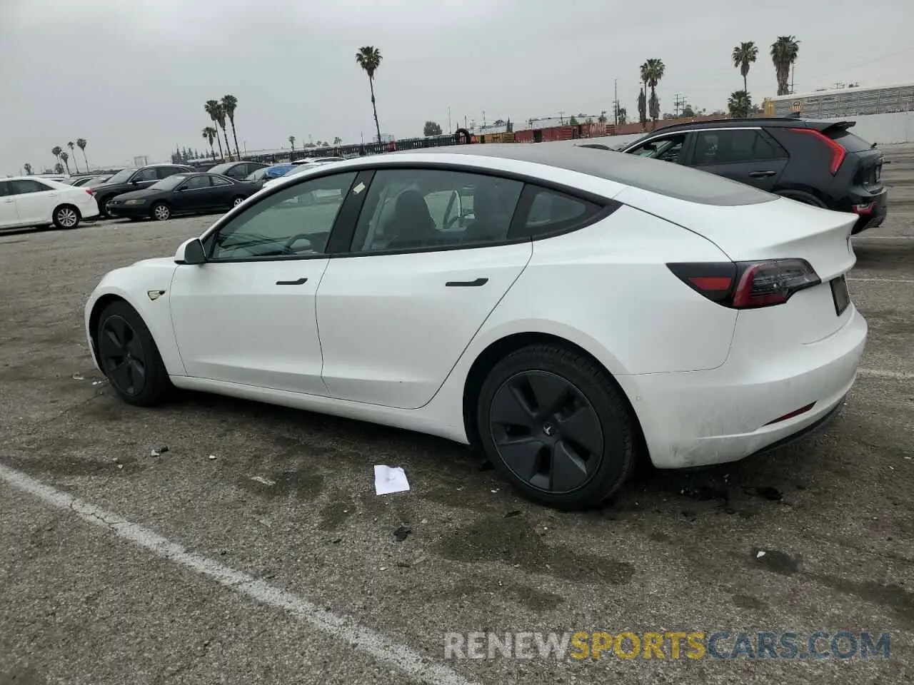 2 fotografías del automóvil dañado 5YJ3E1EAXMF940500 TESLA MODEL 3 2021