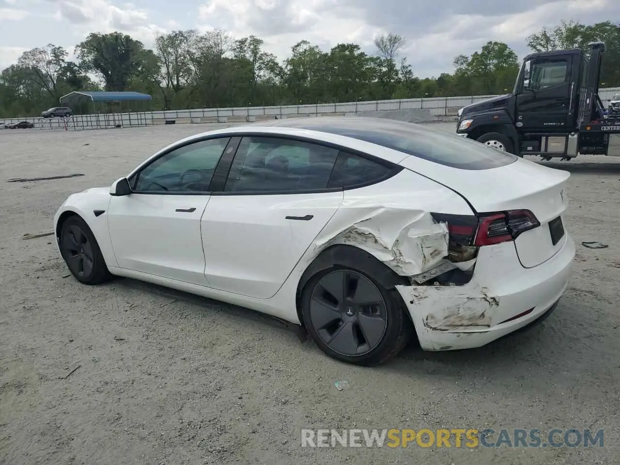 2 fotografías del automóvil dañado 5YJ3E1EAXMF973450 TESLA MODEL 3 2021