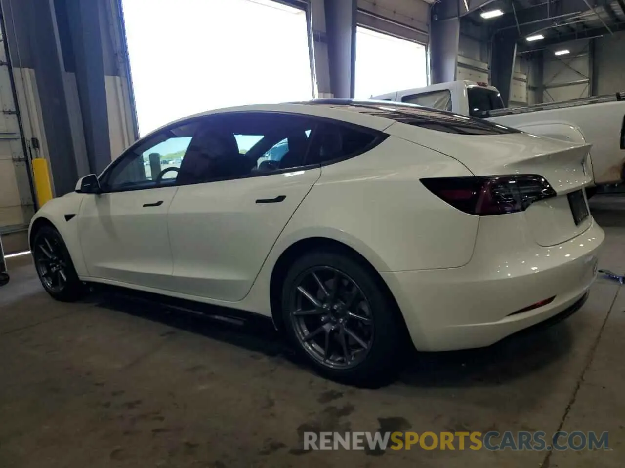 2 fotografías del automóvil dañado 5YJ3E1EAXMF991558 TESLA MODEL 3 2021