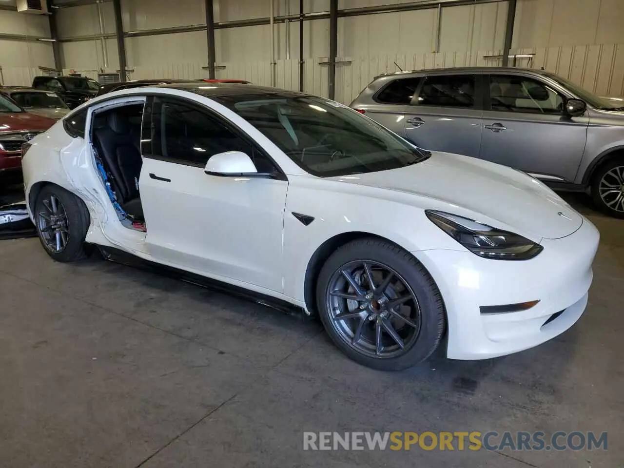 4 fotografías del automóvil dañado 5YJ3E1EAXMF991558 TESLA MODEL 3 2021