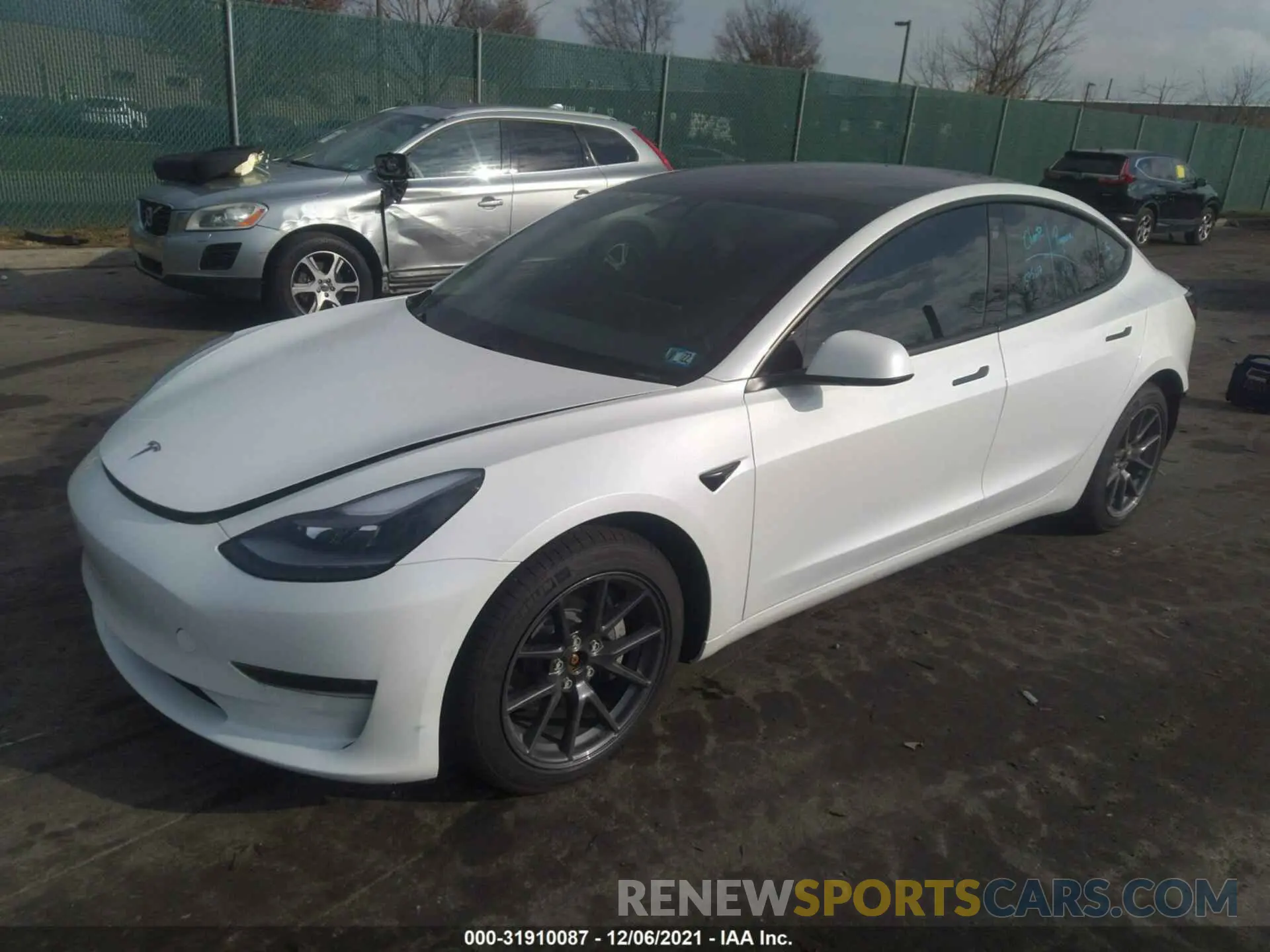 2 fotografías del automóvil dañado 5YJ3E1EB0MF984207 TESLA MODEL 3 2021