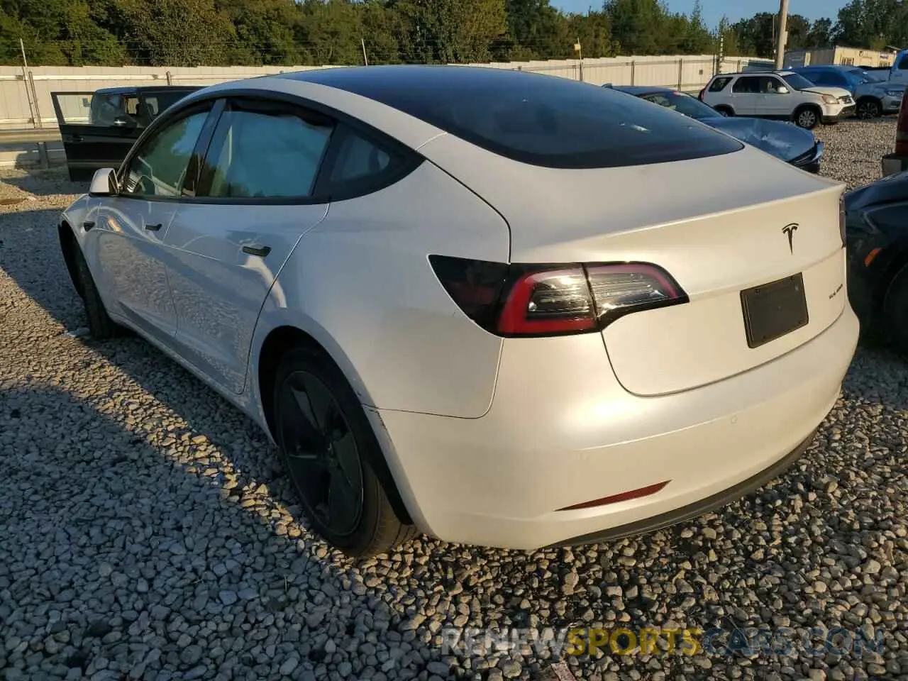 2 fotografías del automóvil dañado 5YJ3E1EB0MF992310 TESLA MODEL 3 2021