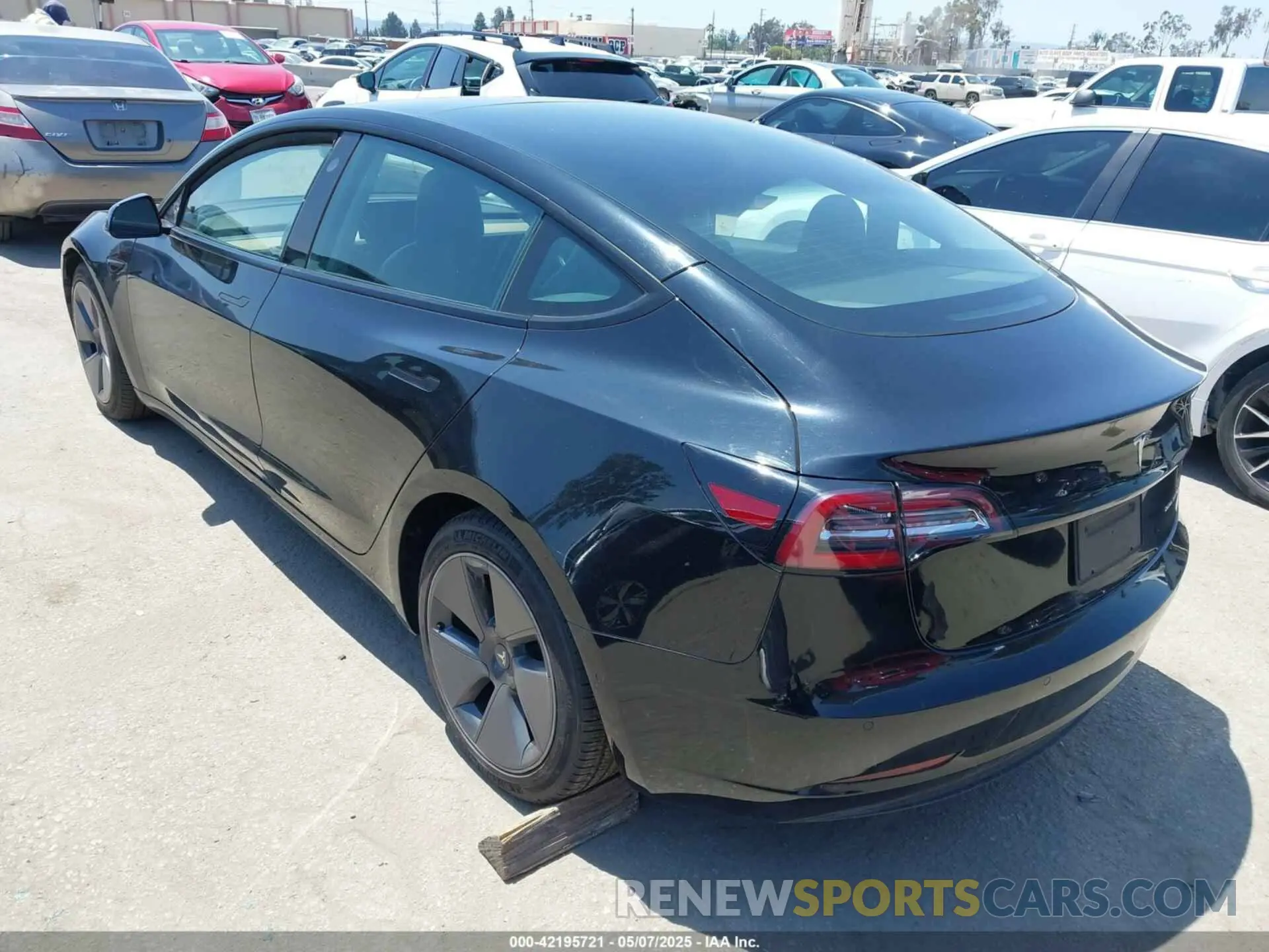 3 fotografías del automóvil dañado 5YJ3E1EB0MF995790 TESLA MODEL 3 2021