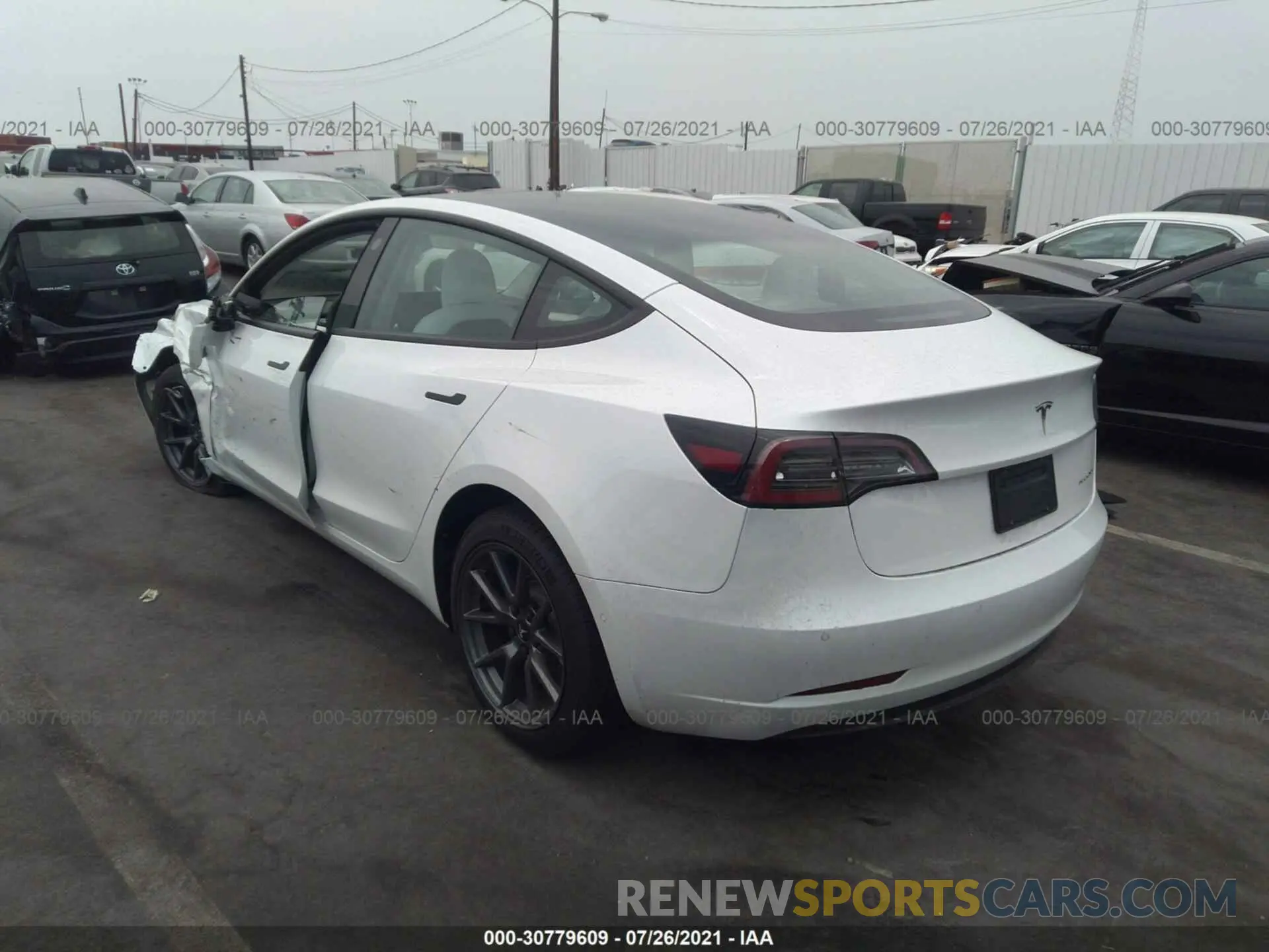 3 fotografías del automóvil dañado 5YJ3E1EB1MF001017 TESLA MODEL 3 2021
