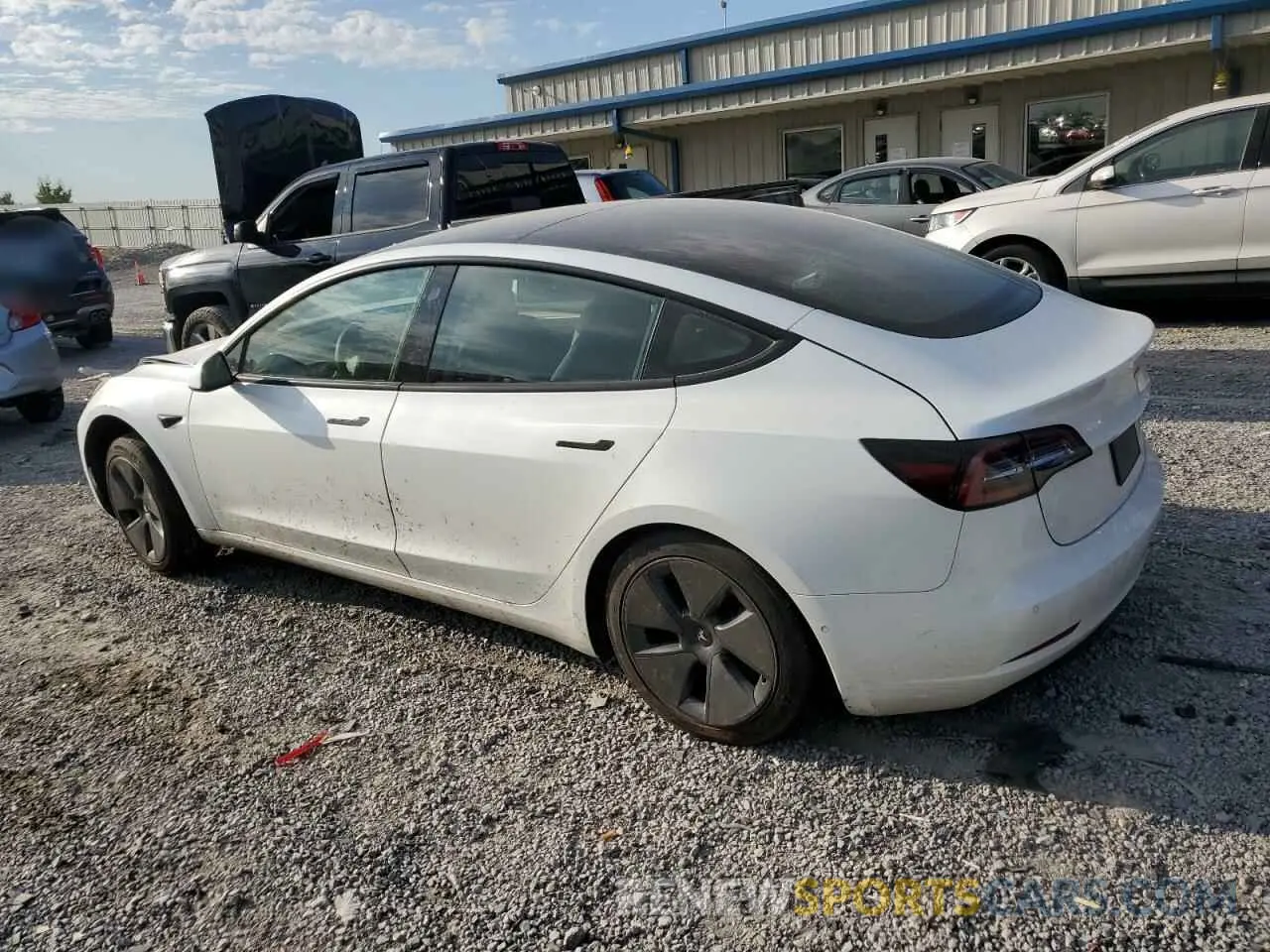 2 fotografías del automóvil dañado 5YJ3E1EB1MF002247 TESLA MODEL 3 2021