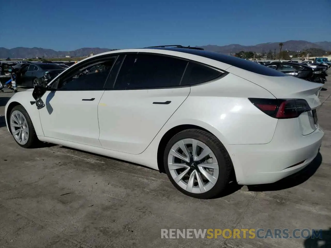 2 fotografías del automóvil dañado 5YJ3E1EB1MF064716 TESLA MODEL 3 2021