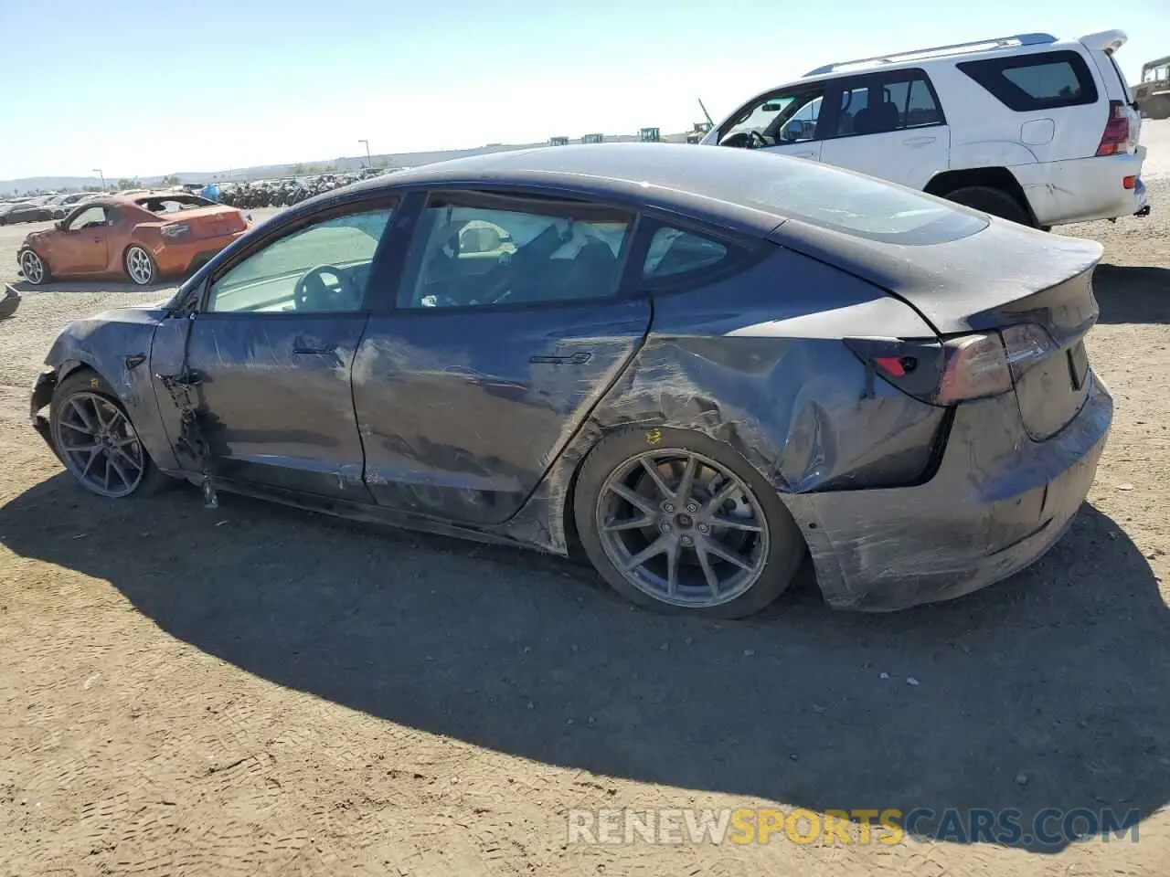 2 fotografías del automóvil dañado 5YJ3E1EB1MF076333 TESLA MODEL 3 2021