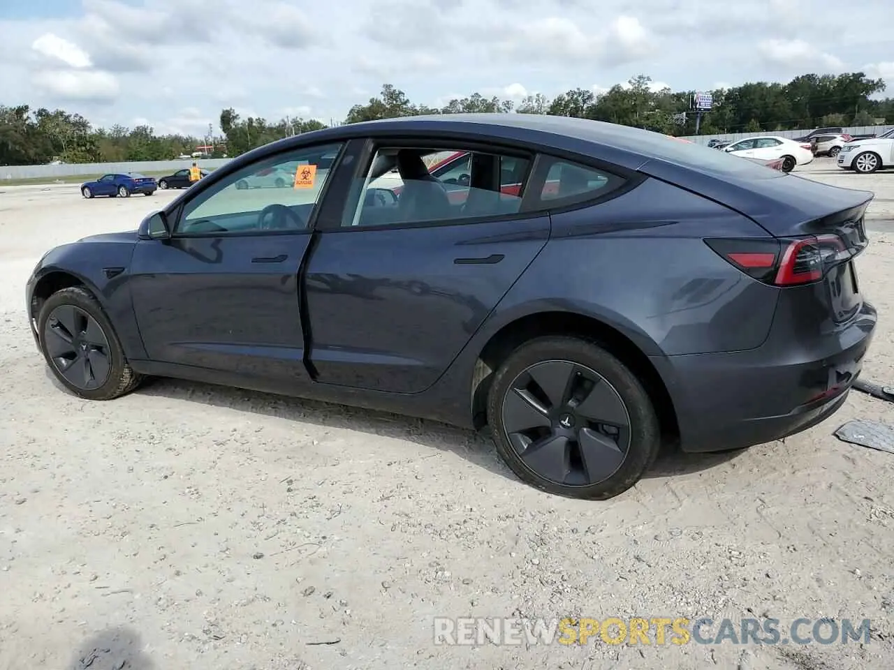 2 fotografías del automóvil dañado 5YJ3E1EB1MF869423 TESLA MODEL 3 2021