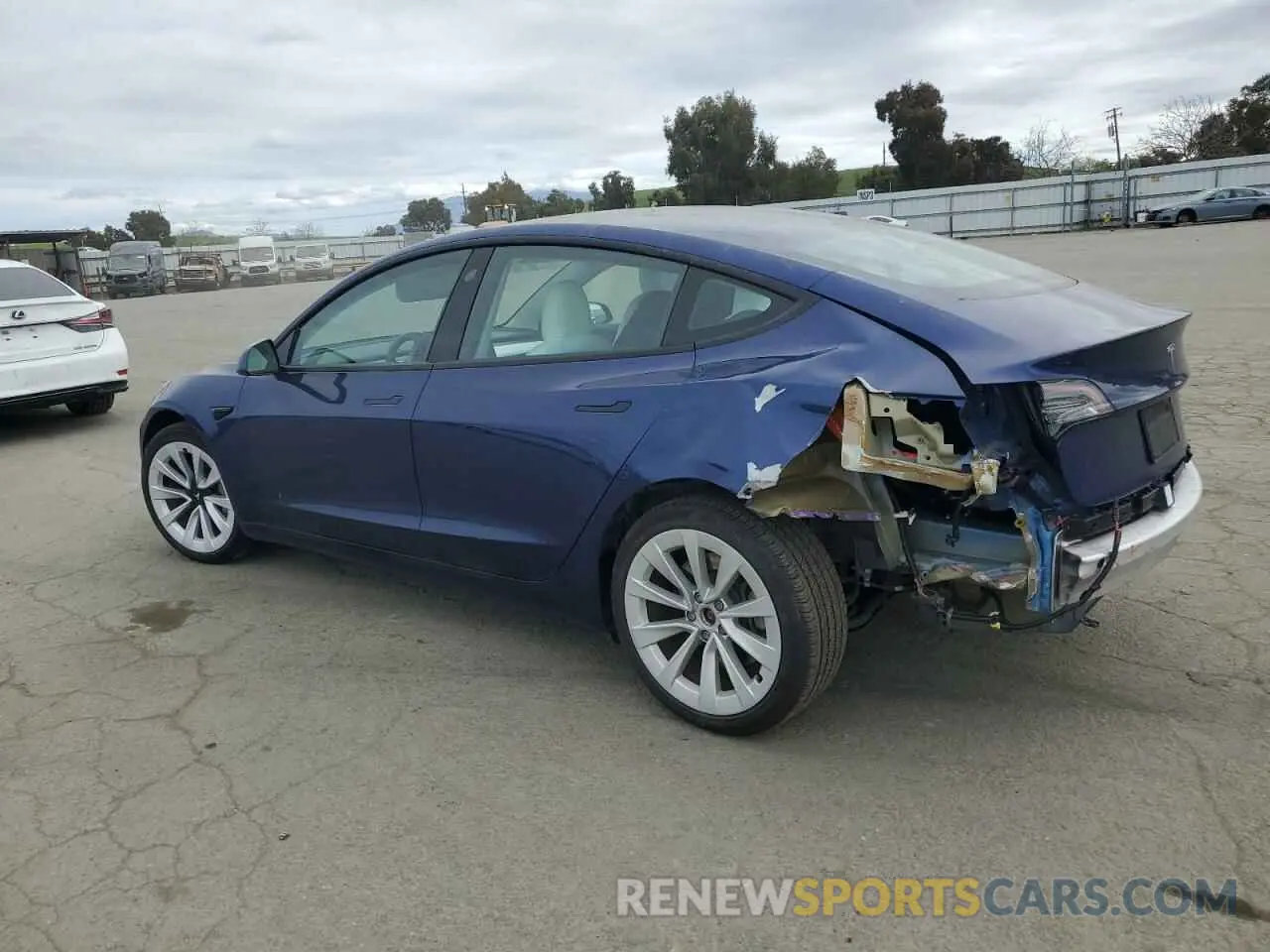 2 fotografías del automóvil dañado 5YJ3E1EB1MF877599 TESLA MODEL 3 2021