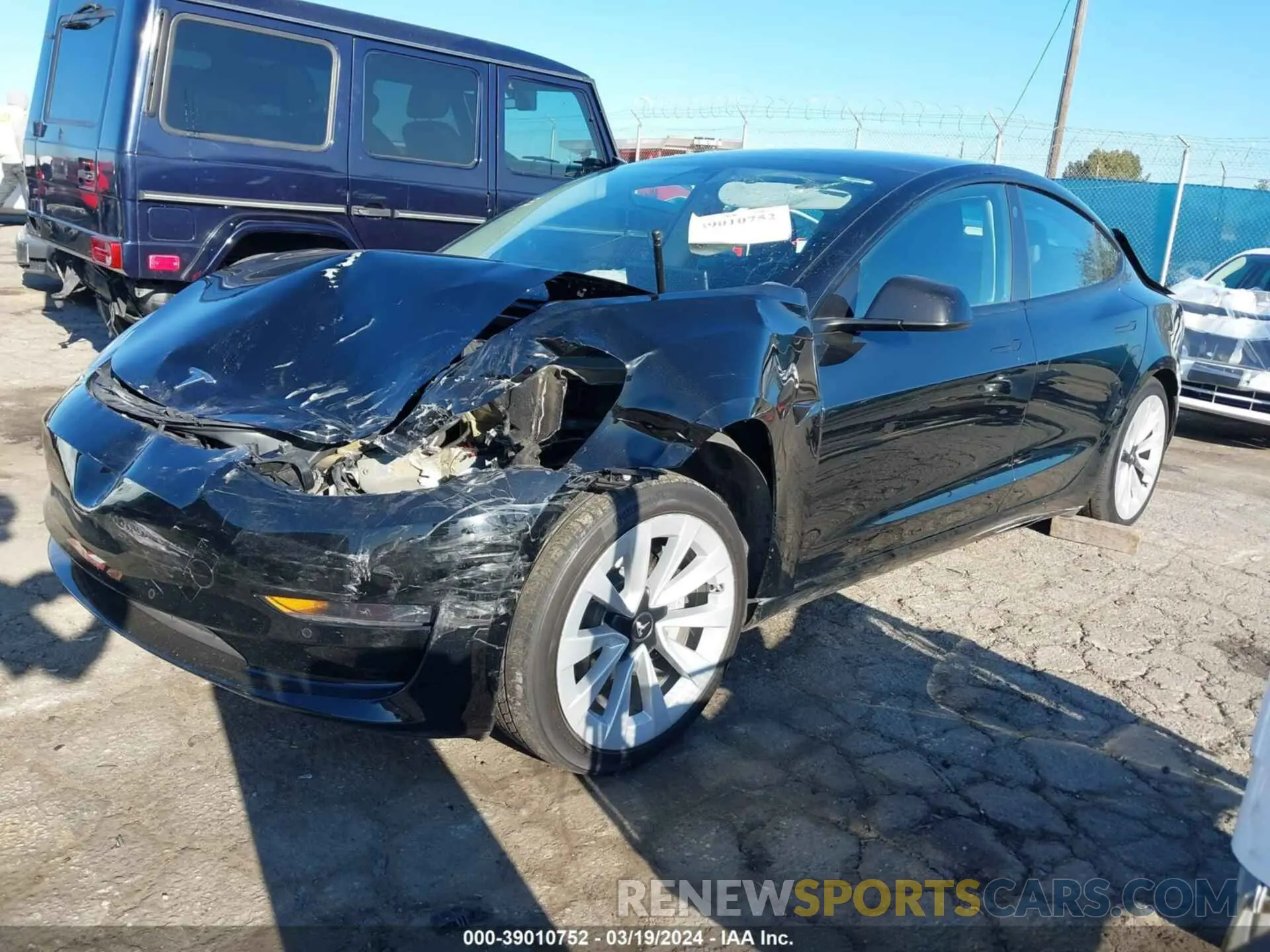 2 fotografías del automóvil dañado 5YJ3E1EB1MF936599 TESLA MODEL 3 2021