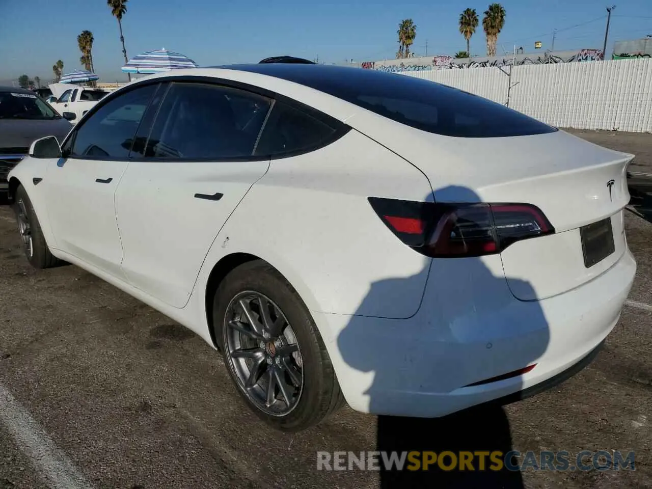 2 fotografías del automóvil dañado 5YJ3E1EB1MF938899 TESLA MODEL 3 2021