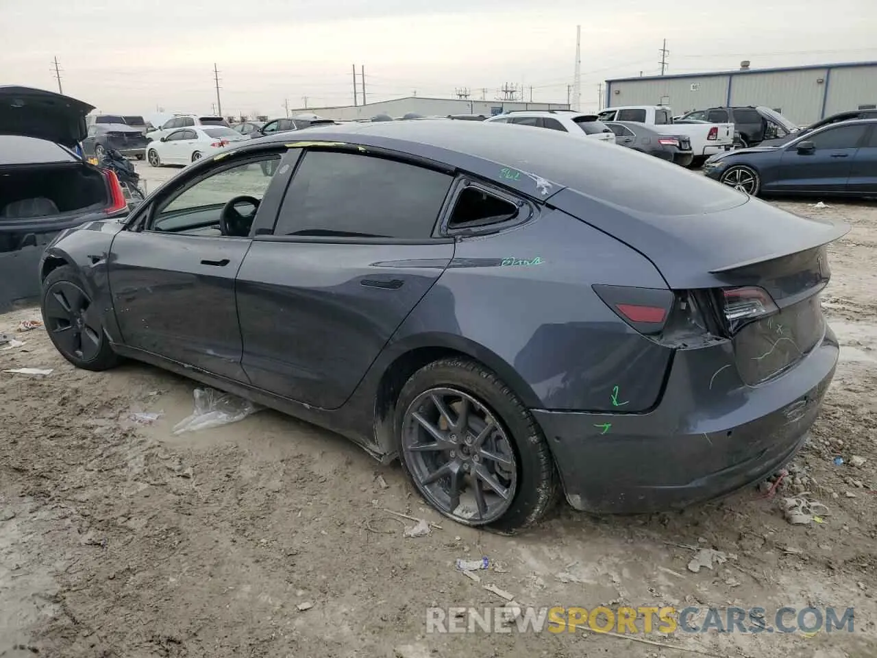 2 fotografías del automóvil dañado 5YJ3E1EB1MF974852 TESLA MODEL 3 2021