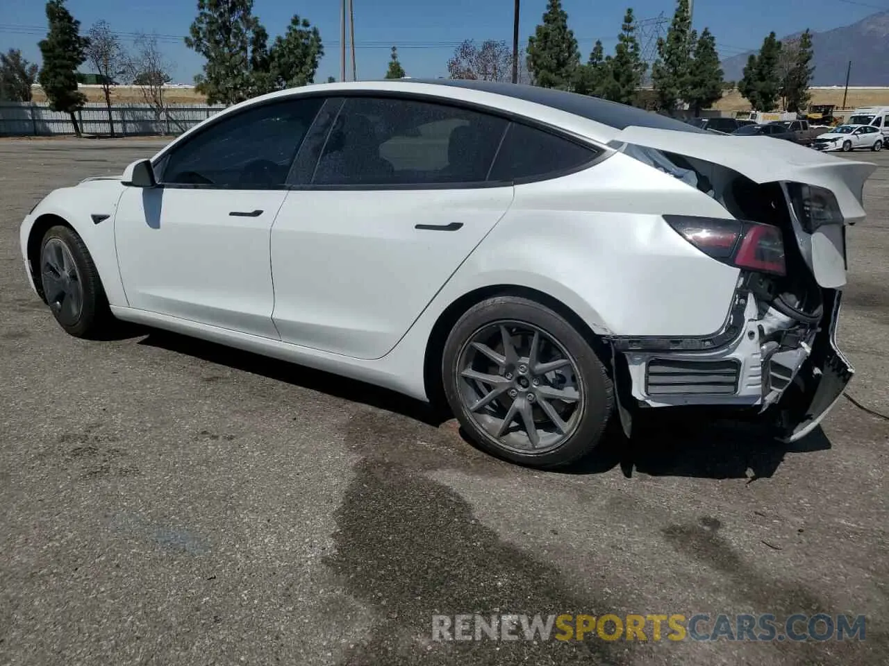 2 fotografías del automóvil dañado 5YJ3E1EB2MF007067 TESLA MODEL 3 2021