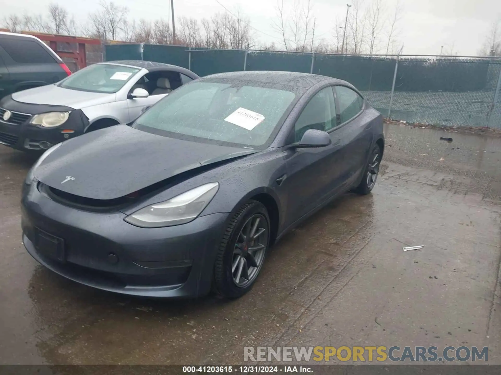 2 fotografías del automóvil dañado 5YJ3E1EB2MF037167 TESLA MODEL 3 2021