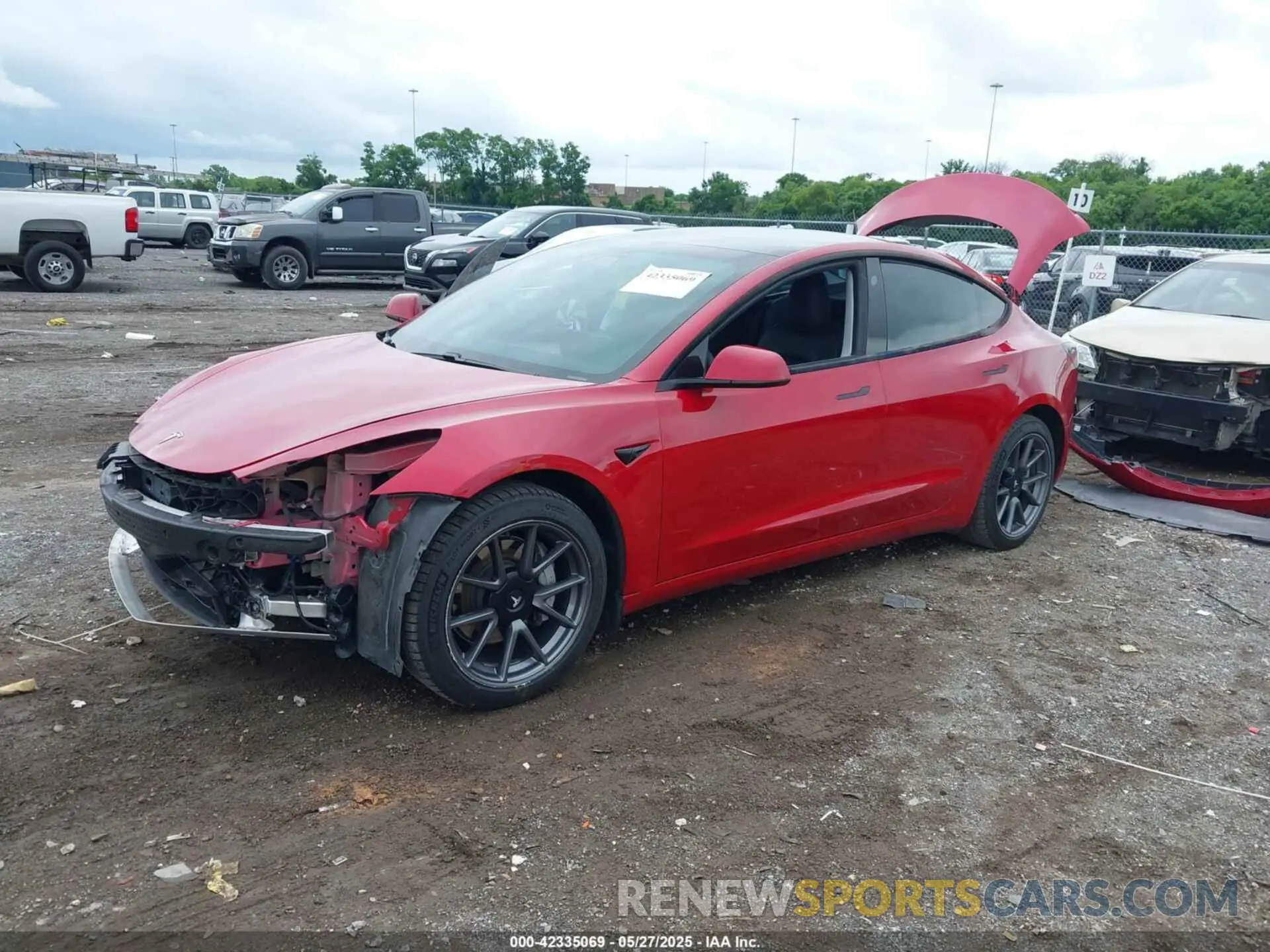 2 fotografías del automóvil dañado 5YJ3E1EB2MF061663 TESLA MODEL 3 2021
