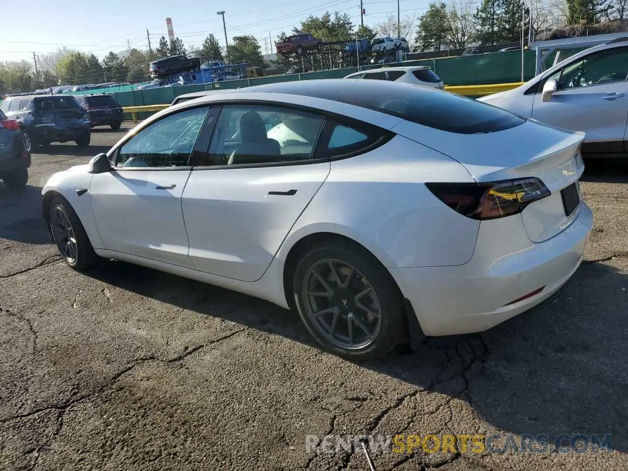 2 fotografías del automóvil dañado 5YJ3E1EB2MF065518 TESLA MODEL 3 2021