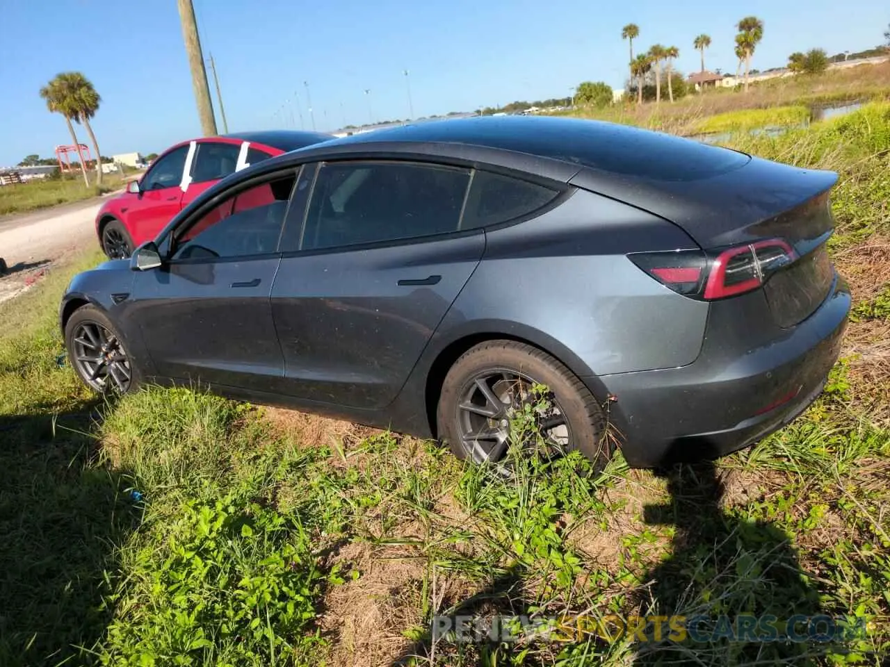 2 fotografías del automóvil dañado 5YJ3E1EB2MF848158 TESLA MODEL 3 2021