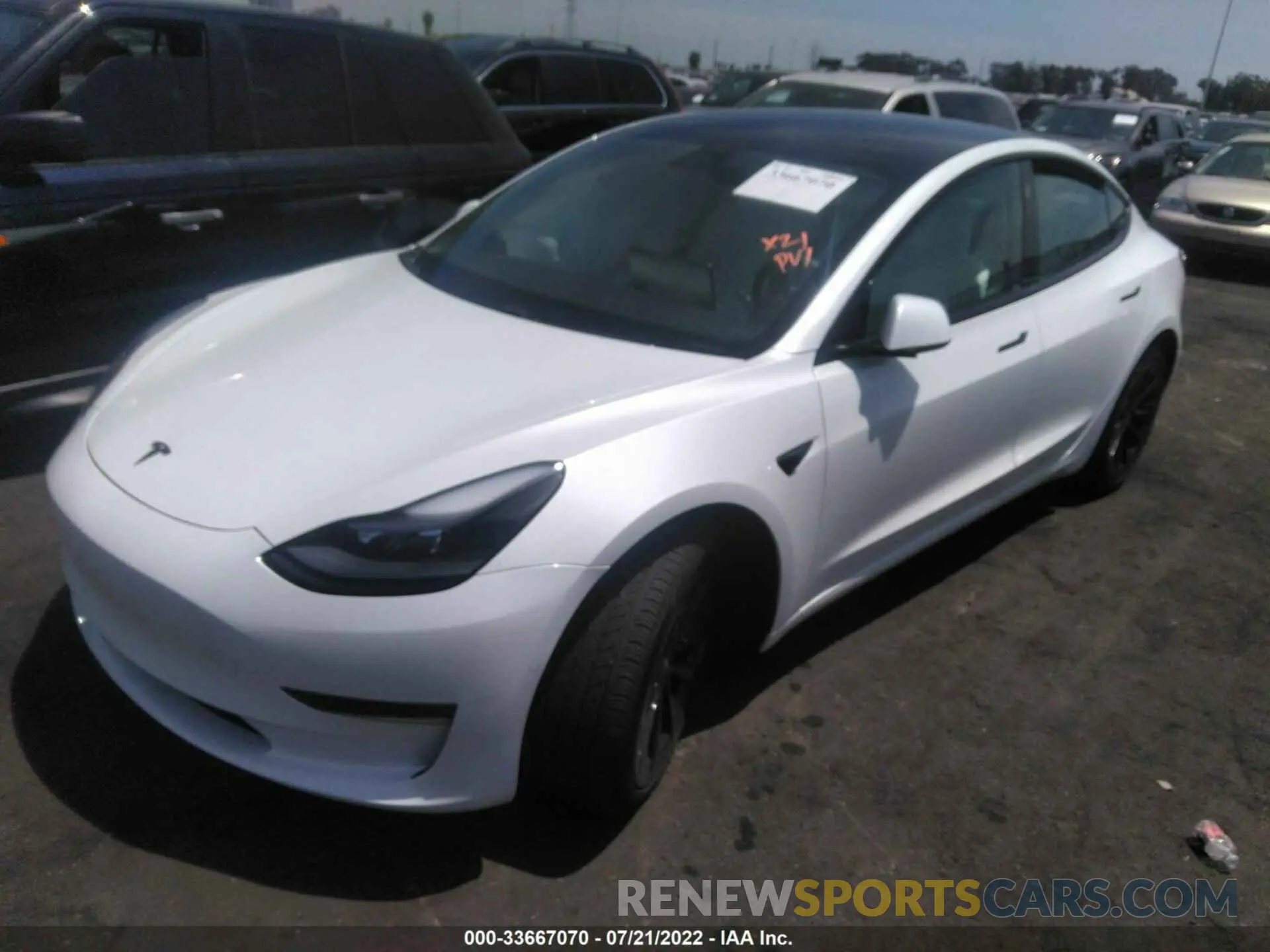 2 fotografías del automóvil dañado 5YJ3E1EB3MF077158 TESLA MODEL 3 2021