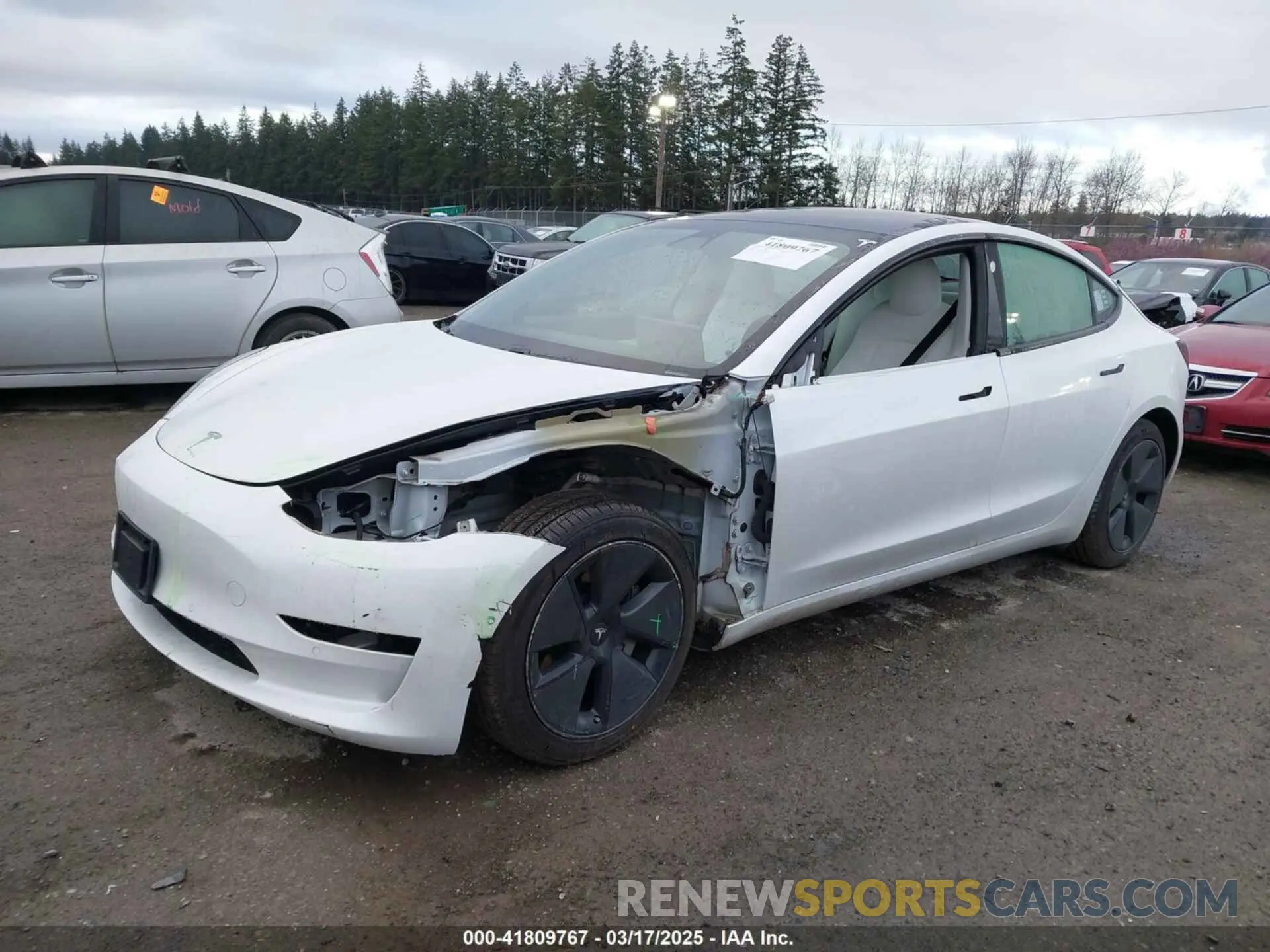 2 fotografías del automóvil dañado 5YJ3E1EB3MF856009 TESLA MODEL 3 2021