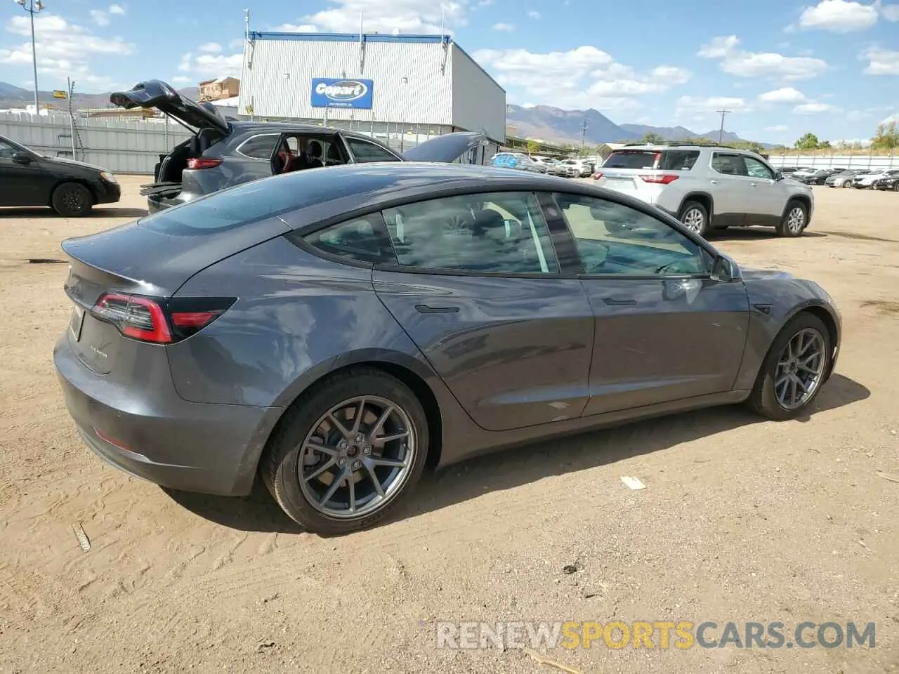3 fotografías del automóvil dañado 5YJ3E1EB3MF862036 TESLA MODEL 3 2021