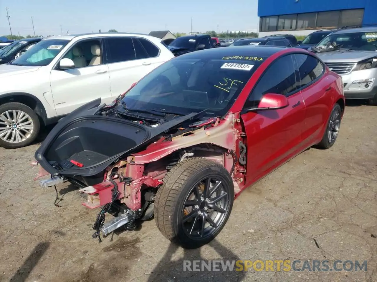 2 fotografías del automóvil dañado 5YJ3E1EB3MF973248 TESLA MODEL 3 2021
