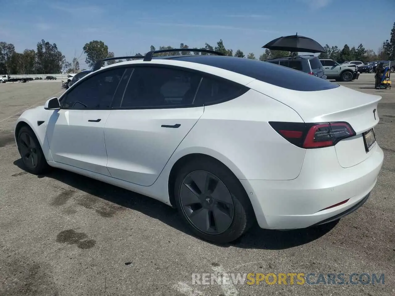 2 fotografías del automóvil dañado 5YJ3E1EB4MF002906 TESLA MODEL 3 2021