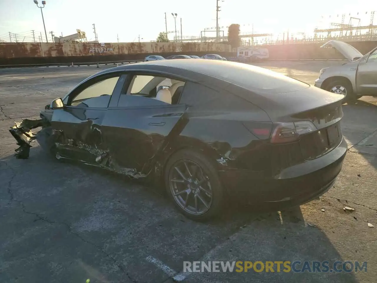 2 fotografías del automóvil dañado 5YJ3E1EB4MF068131 TESLA MODEL 3 2021