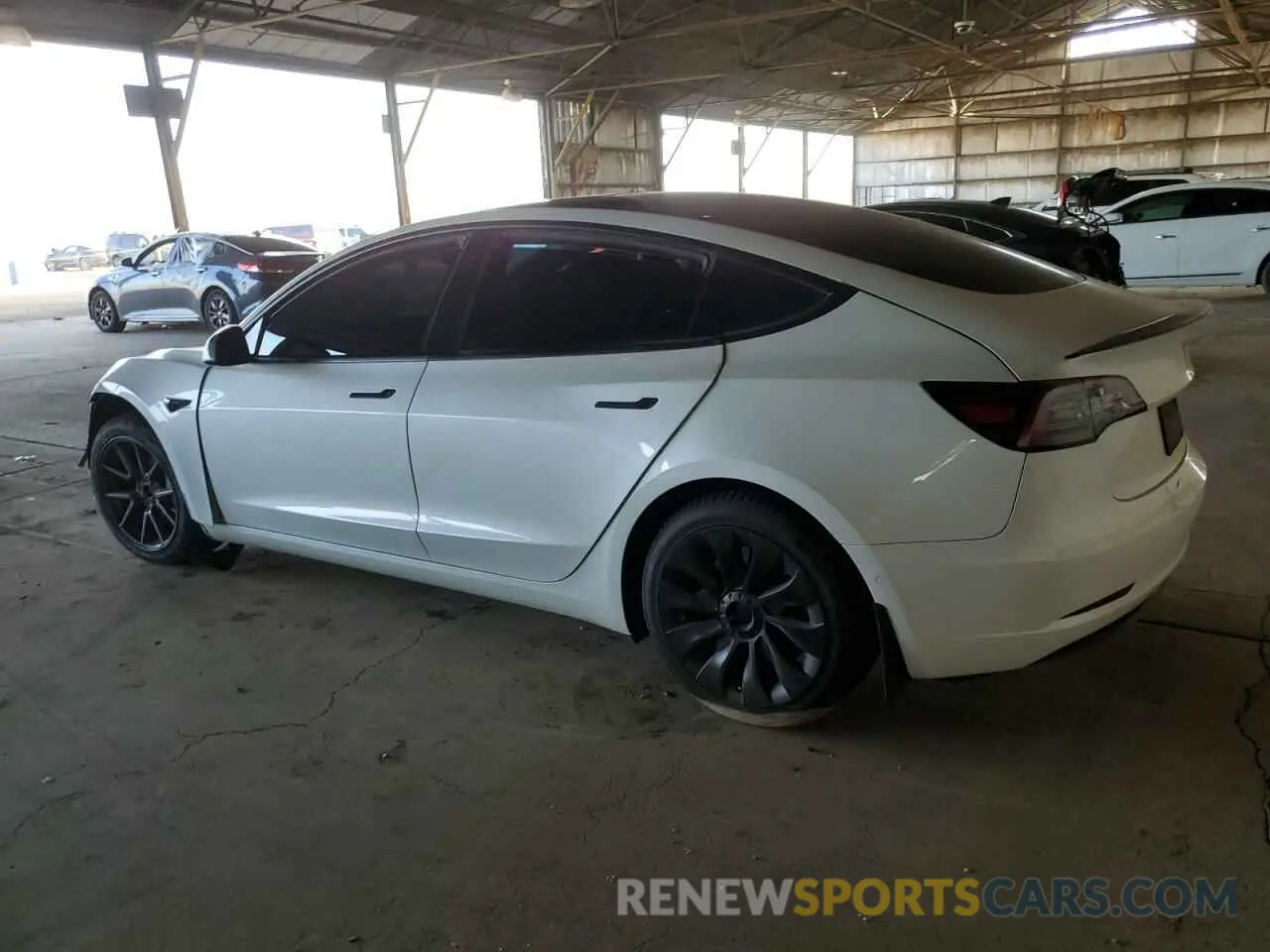 2 fotografías del automóvil dañado 5YJ3E1EB4MF938427 TESLA MODEL 3 2021