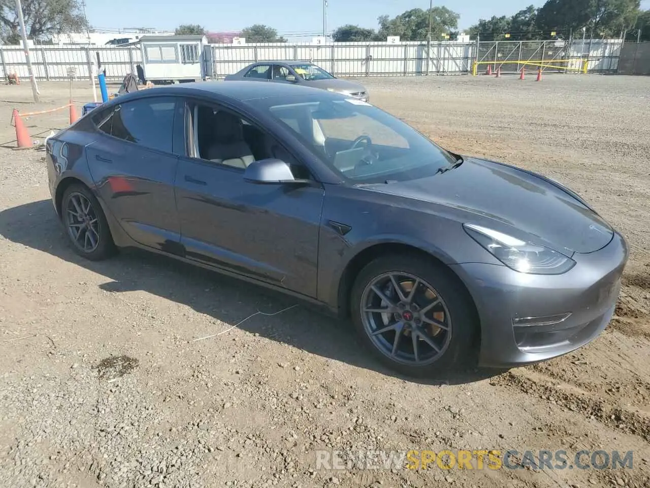 4 fotografías del automóvil dañado 5YJ3E1EB5MF869277 TESLA MODEL 3 2021
