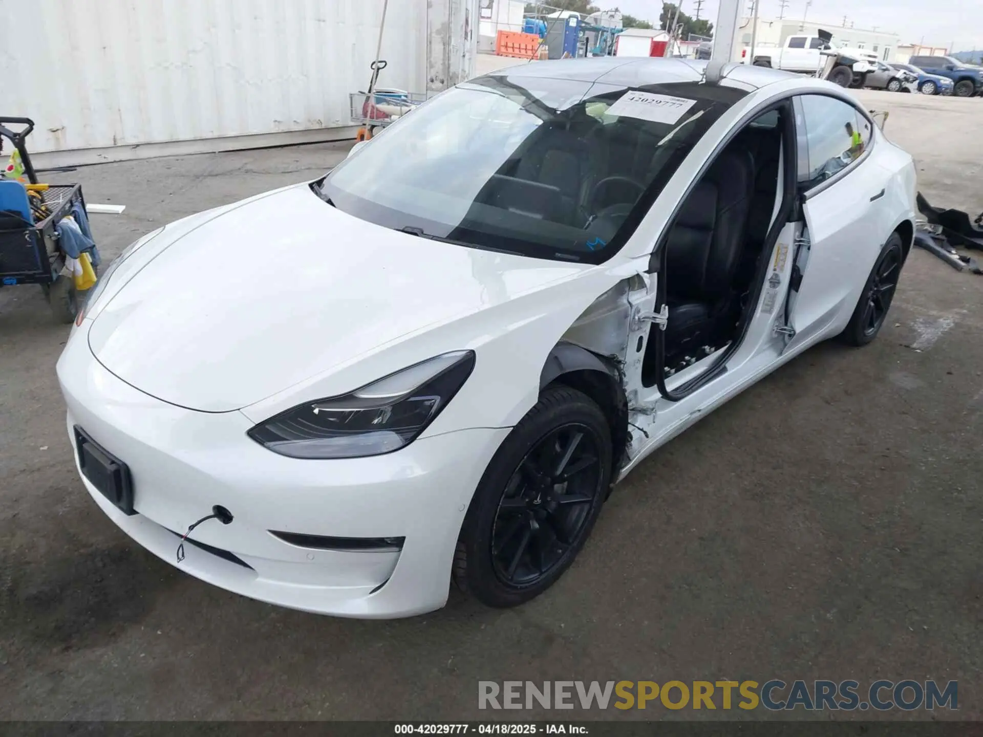 2 fotografías del automóvil dañado 5YJ3E1EB5MF872874 TESLA MODEL 3 2021