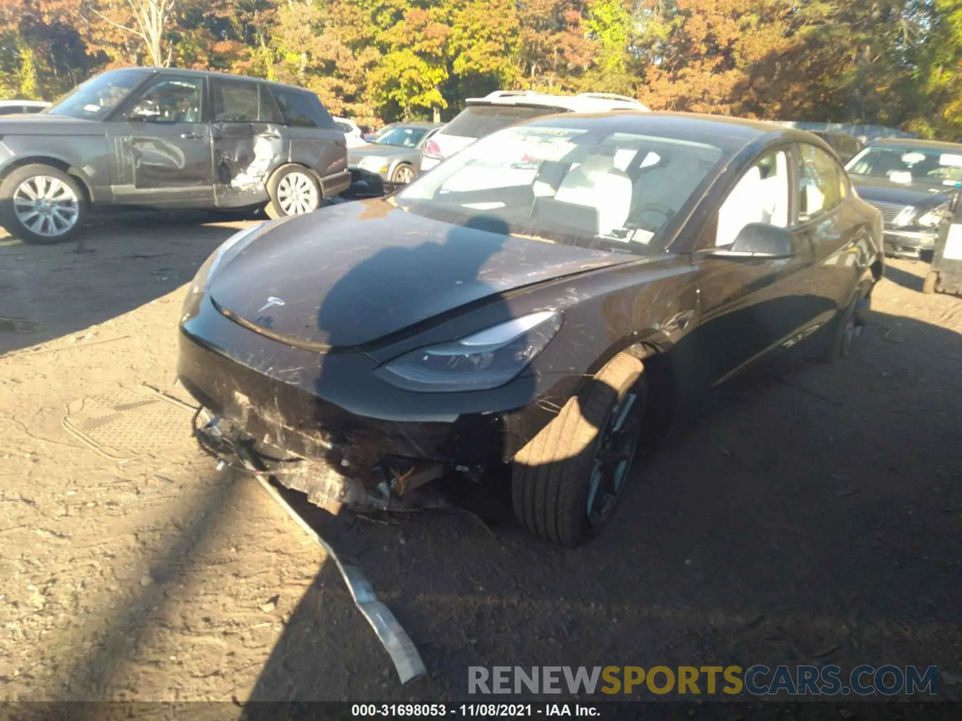 2 fotografías del automóvil dañado 5YJ3E1EB6MF053002 TESLA MODEL 3 2021
