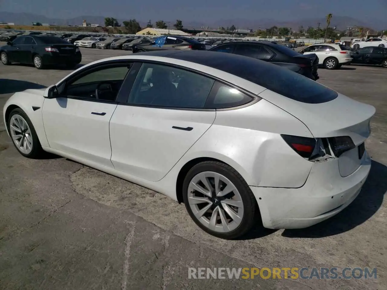 2 fotografías del automóvil dañado 5YJ3E1EB6MF877453 TESLA MODEL 3 2021