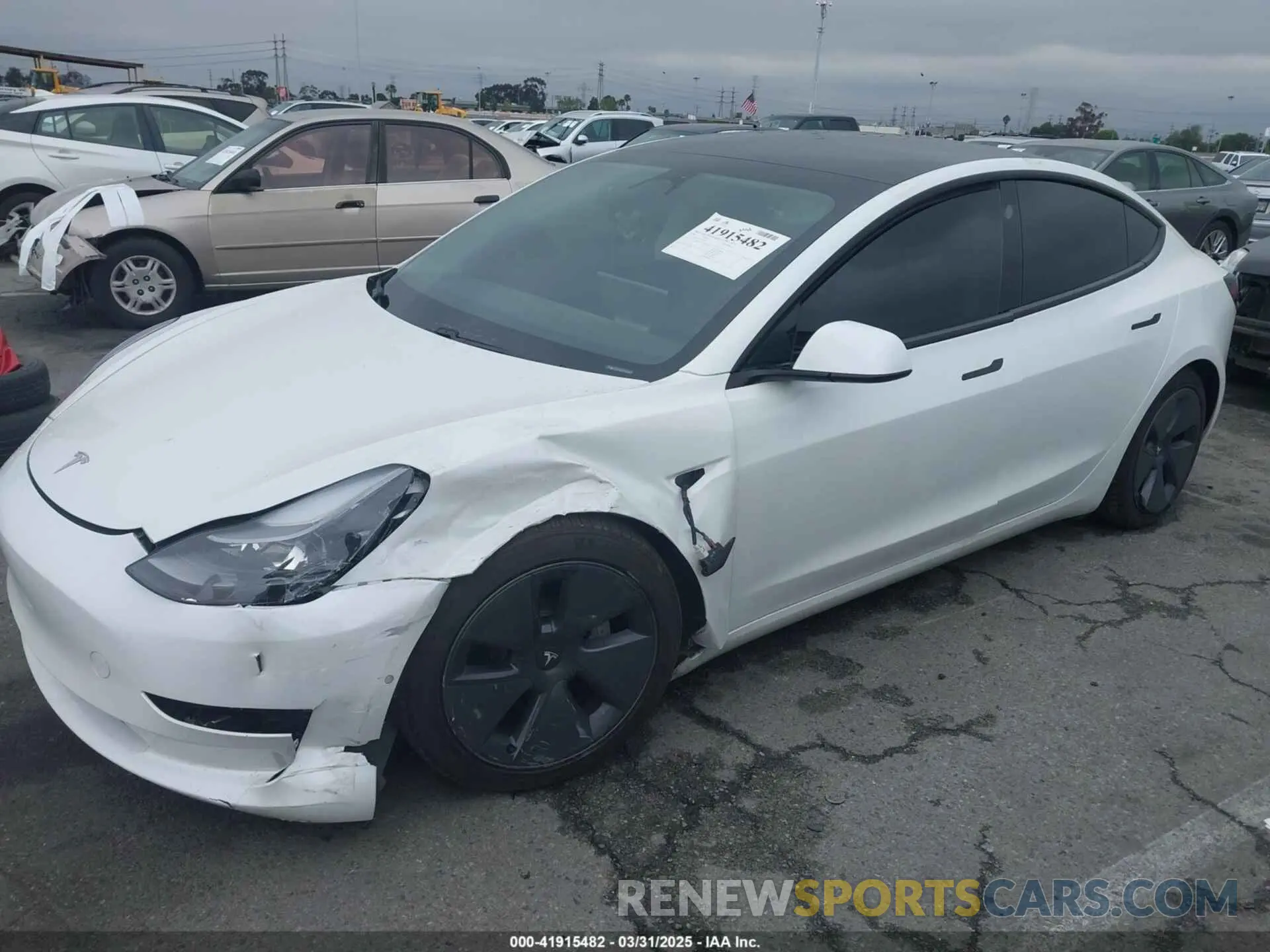 2 fotografías del automóvil dañado 5YJ3E1EB6MF878957 TESLA MODEL 3 2021