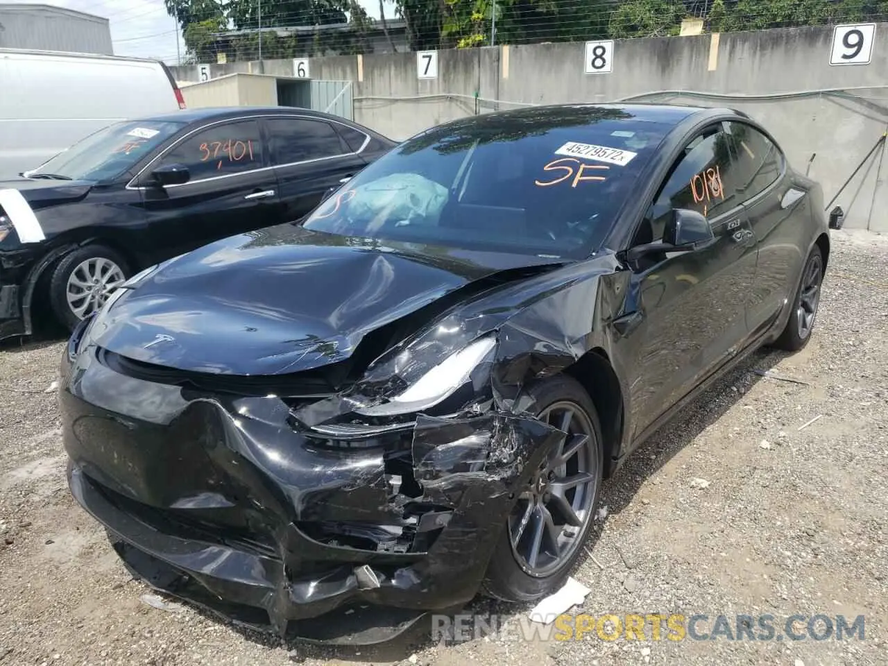 2 fotografías del automóvil dañado 5YJ3E1EB6MF924528 TESLA MODEL 3 2021