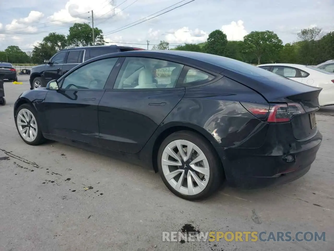 2 fotografías del automóvil dañado 5YJ3E1EB6MF980646 TESLA MODEL 3 2021