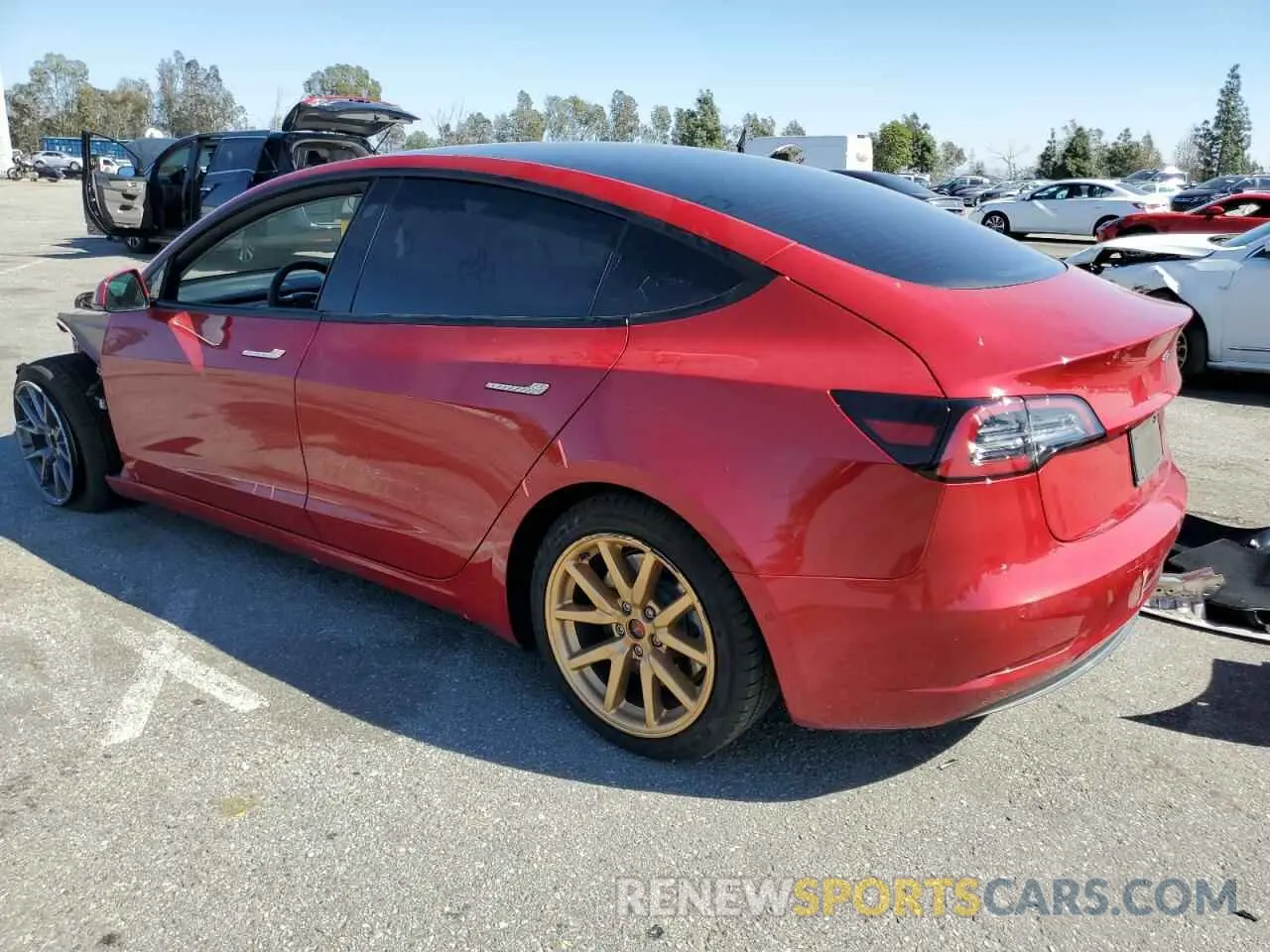 2 fotografías del automóvil dañado 5YJ3E1EB7MF002169 TESLA MODEL 3 2021