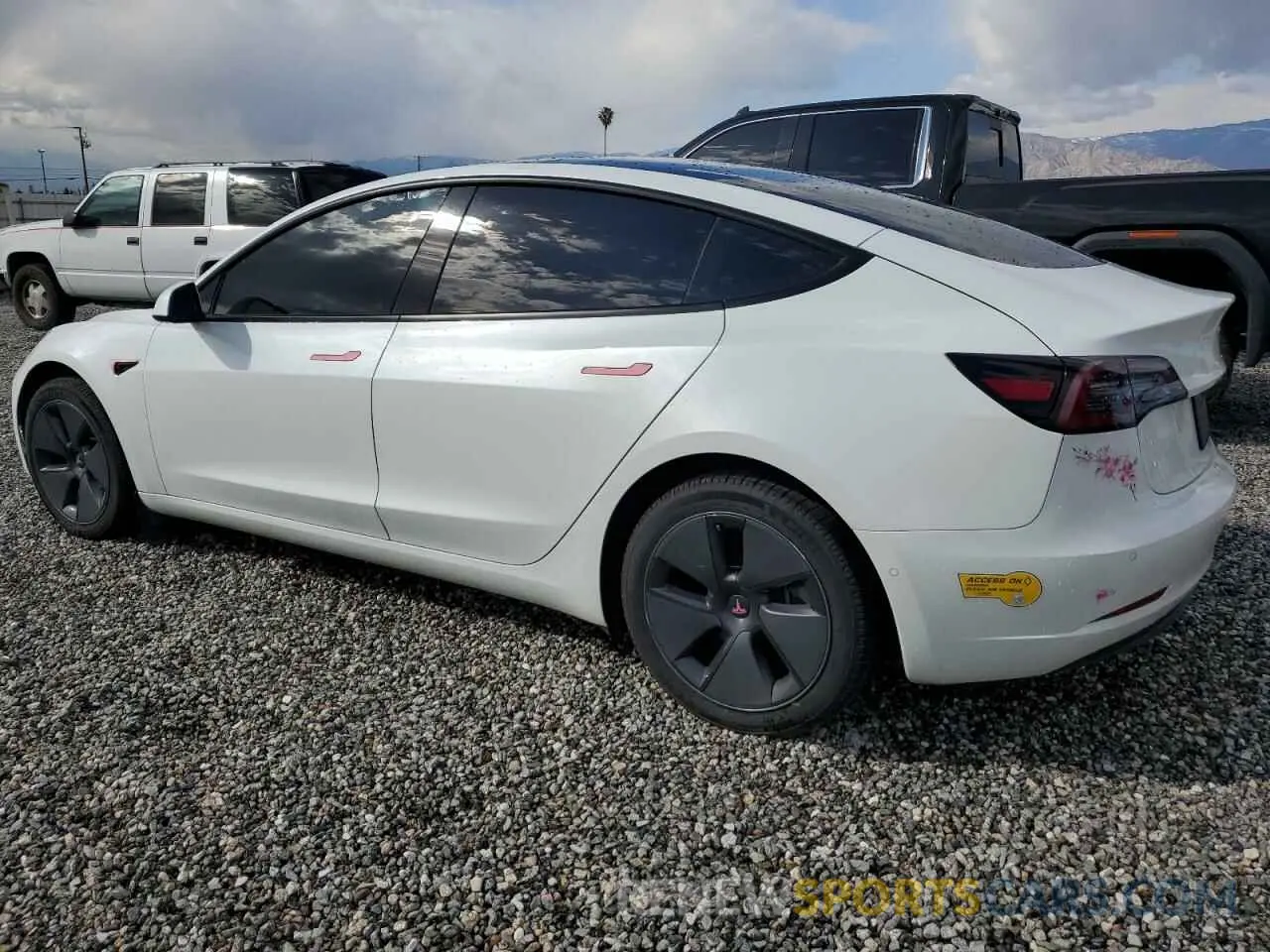 2 fotografías del automóvil dañado 5YJ3E1EB7MF060329 TESLA MODEL 3 2021