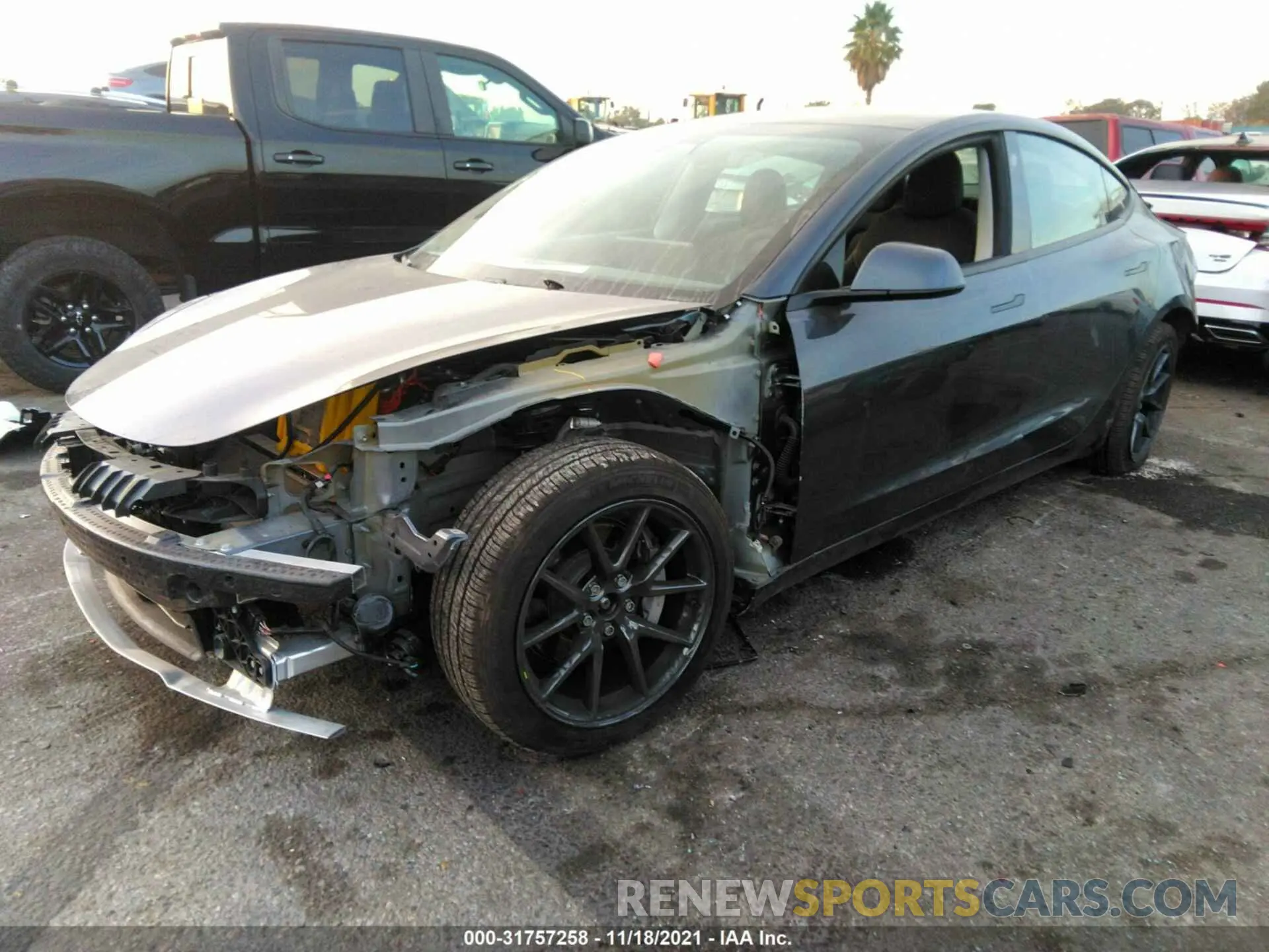 2 fotografías del automóvil dañado 5YJ3E1EB7MF067426 TESLA MODEL 3 2021