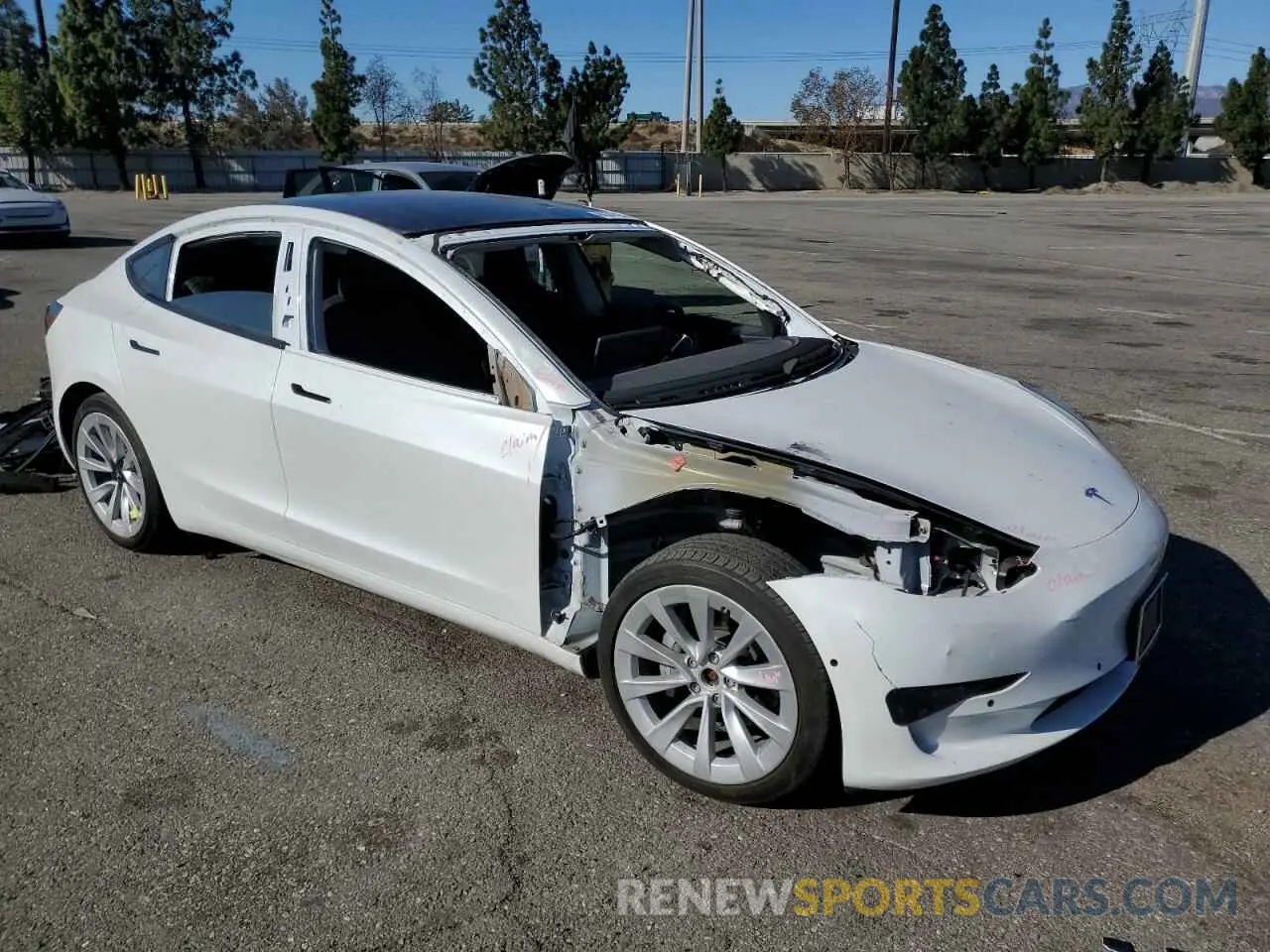 4 fotografías del automóvil dañado 5YJ3E1EB8MF872884 TESLA MODEL 3 2021