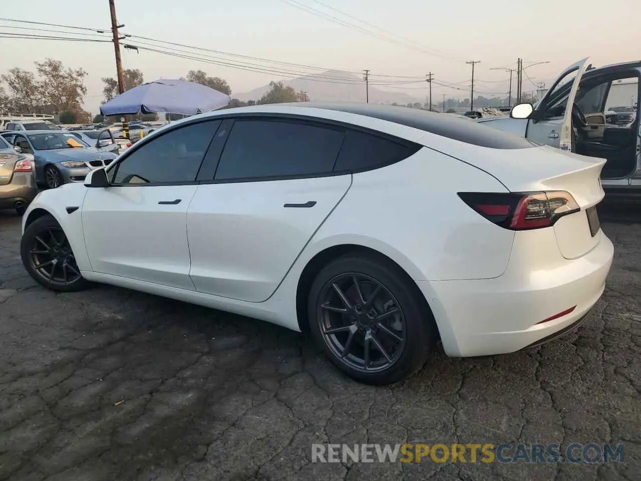 2 fotografías del automóvil dañado 5YJ3E1EB9MF872649 TESLA MODEL 3 2021