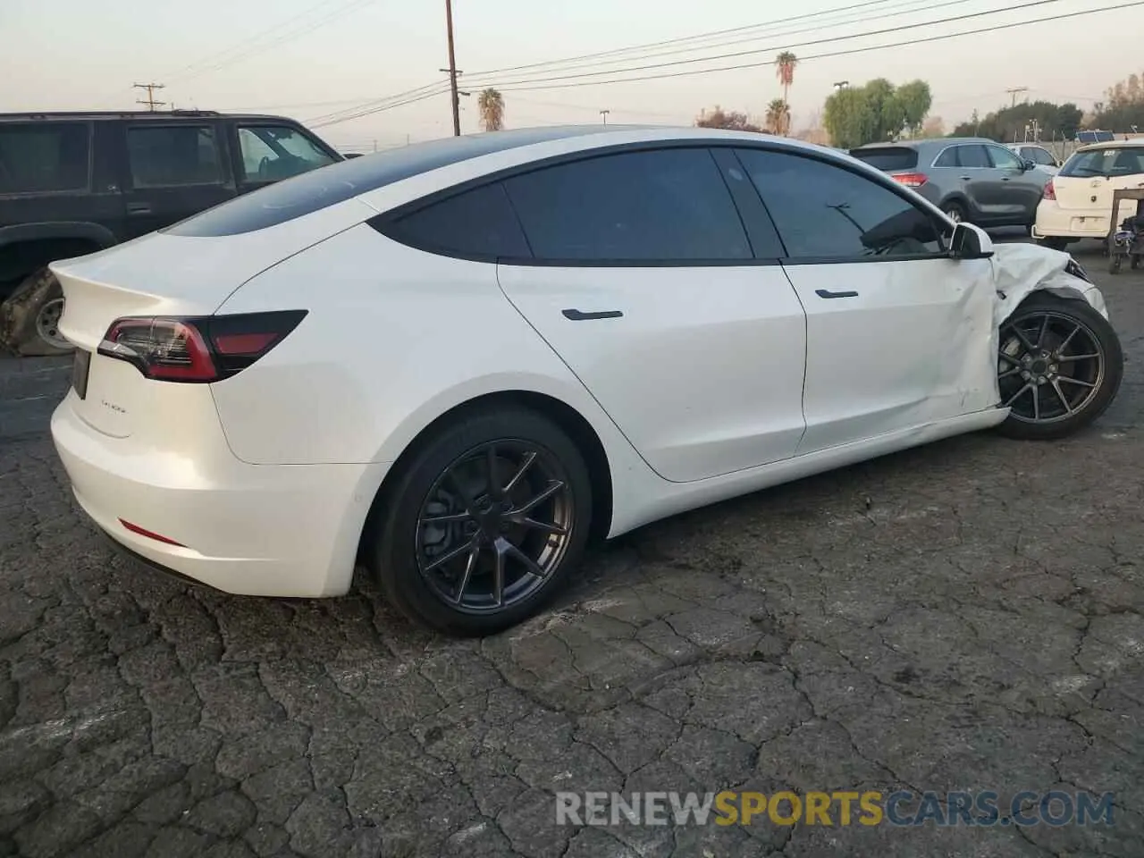 3 fotografías del automóvil dañado 5YJ3E1EB9MF872649 TESLA MODEL 3 2021