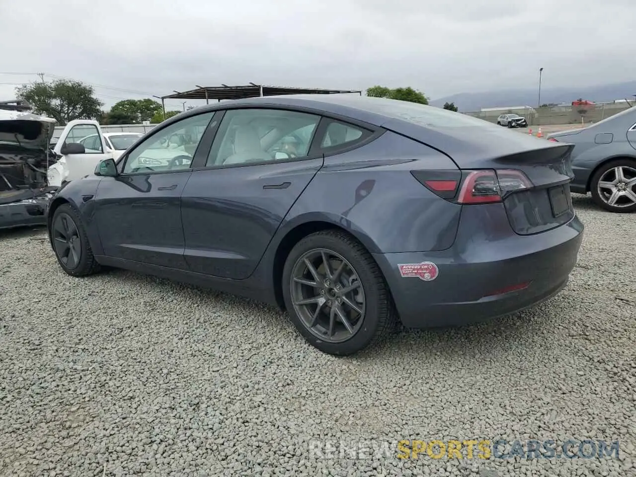 2 fotografías del automóvil dañado 5YJ3E1EB9MF937533 TESLA MODEL 3 2021