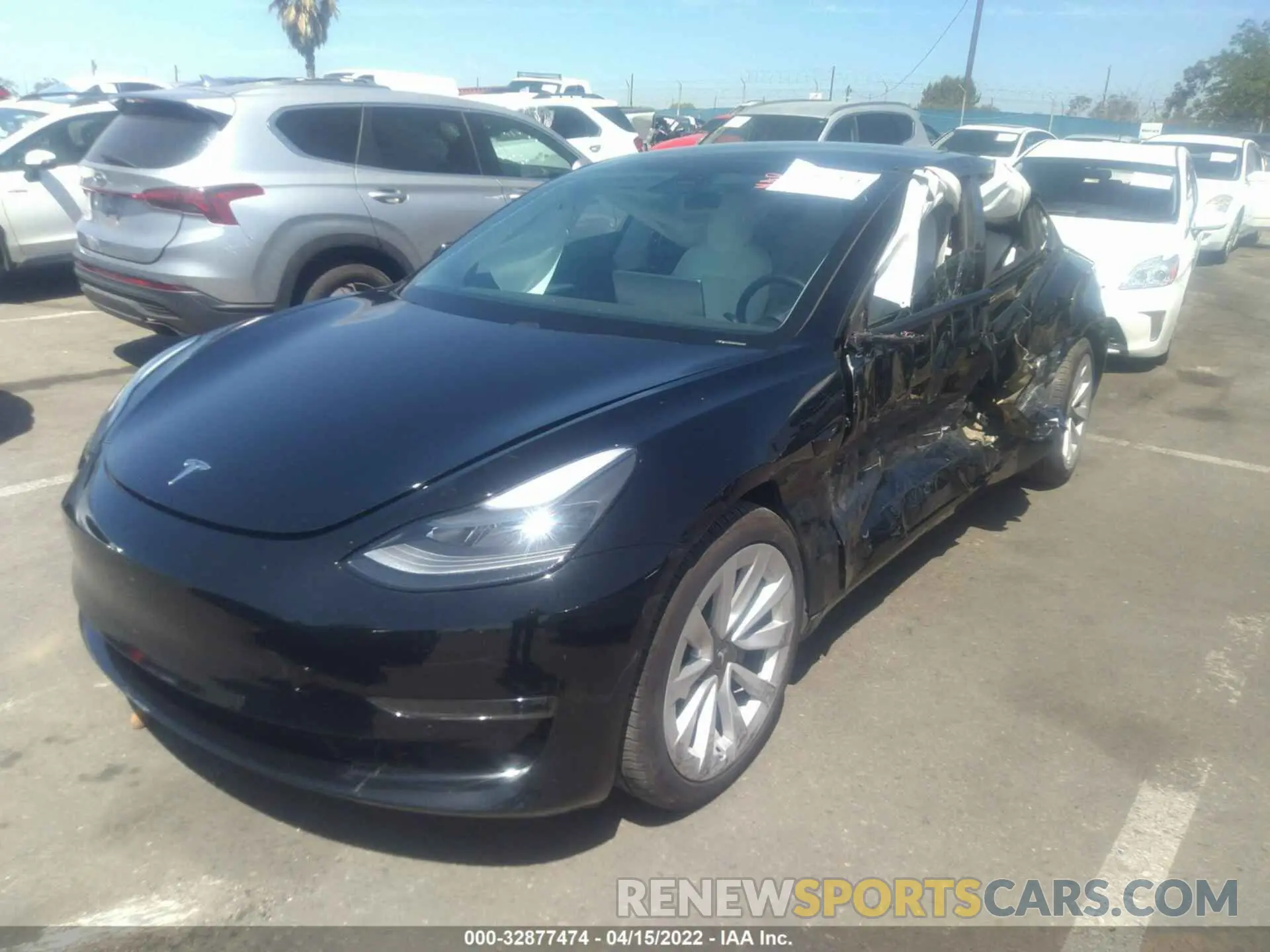 2 fotografías del automóvil dañado 5YJ3E1EB9MF999630 TESLA MODEL 3 2021