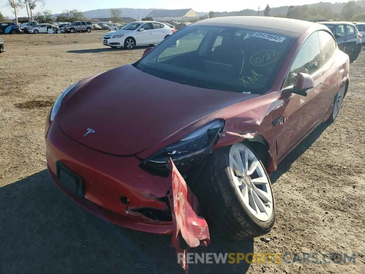 2 fotografías del automóvil dañado 5YJ3E1EBXMF064987 TESLA MODEL 3 2021