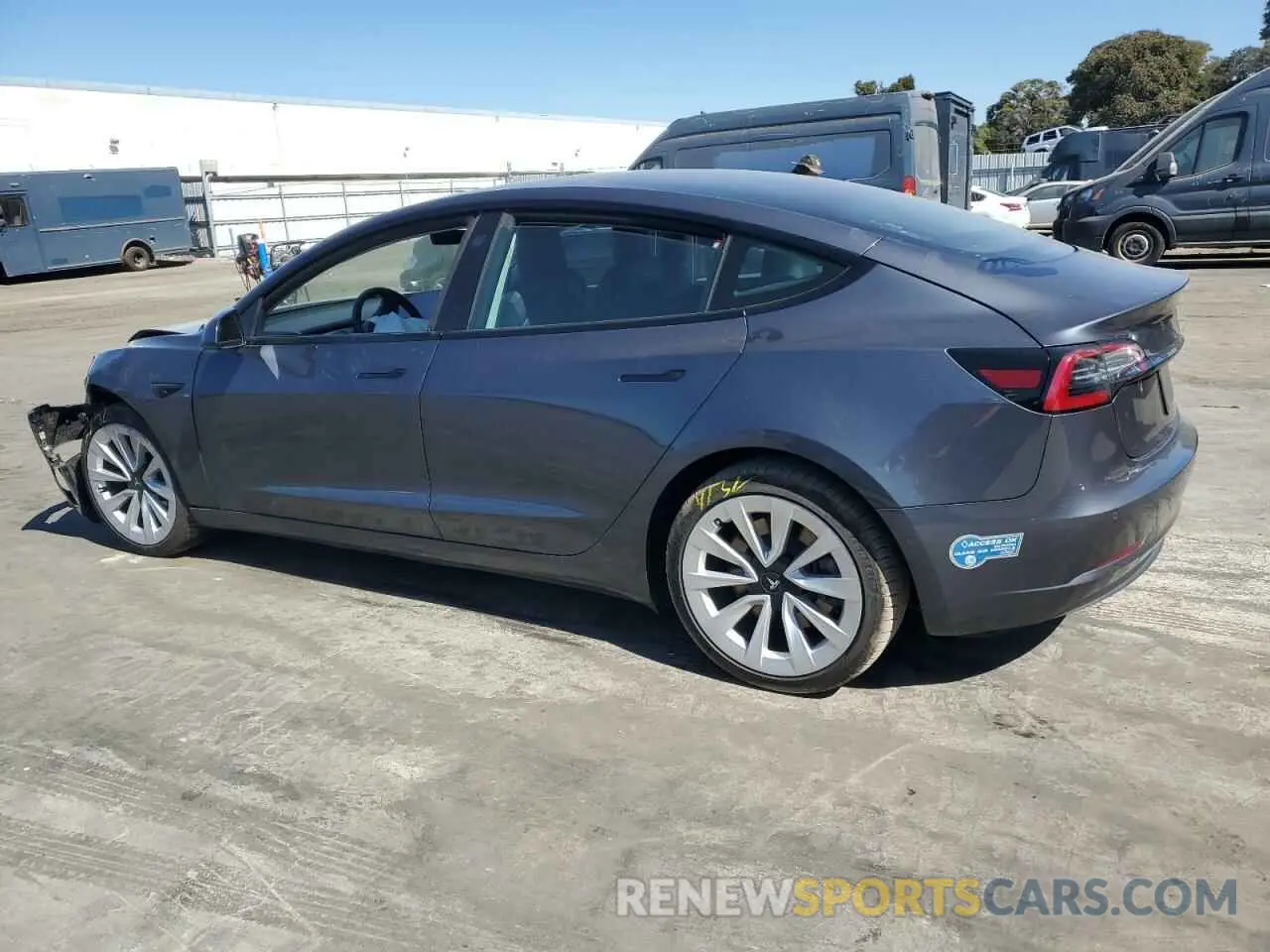 2 fotografías del automóvil dañado 5YJ3E1EBXMF879531 TESLA MODEL 3 2021