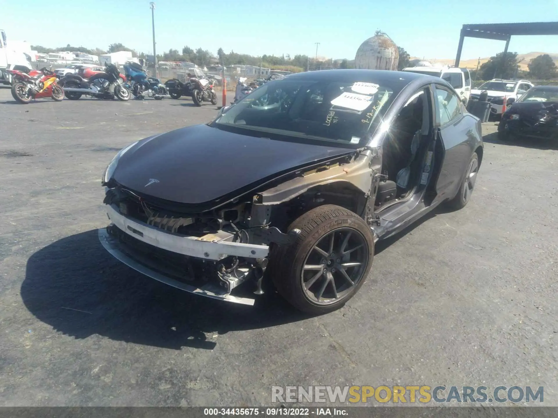 2 fotografías del automóvil dañado 5YJ3E1EBXMF939131 TESLA MODEL 3 2021