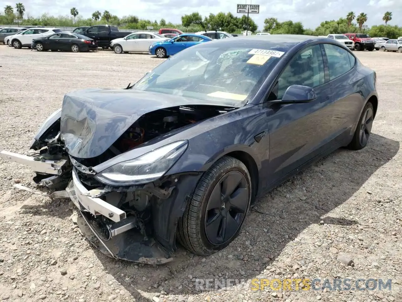 2 fotografías del automóvil dañado 5YJ3E1EBXMF974610 TESLA MODEL 3 2021